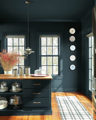 A Regent Green color-drenched kitchen by Benjamin Moore.