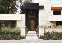 Doors Are More Than Just an Entryway at Castlewood Doors A rift oak door with blackened steel on a home in Cherry Creek.