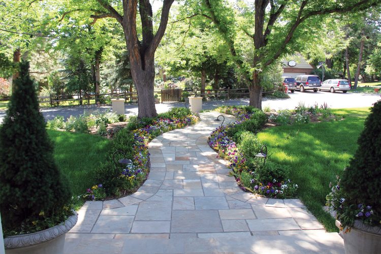 Pathway of a home by Phase One Landscapes.
