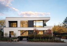 Architecture Rooted in Collaboration and Colorado Style This contemporary home utilizes an existing home’s foundation and footprint with an entirely different aesthetic. Large window and door openings bring in substantial natural light.