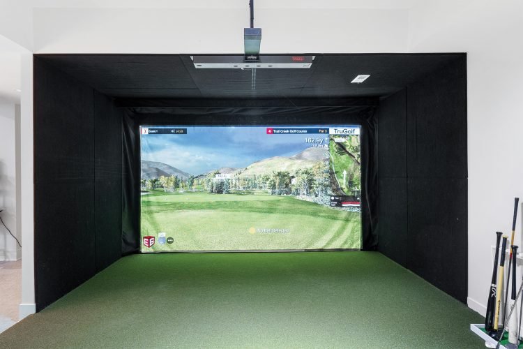 Golf simulator inside a home by QAV.