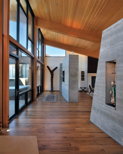 Interior of home designed by Barrett Studio Architects. Distinct building and roof forms and thick concrete walls allow for big views and contemplative spaces in this Boulder home.