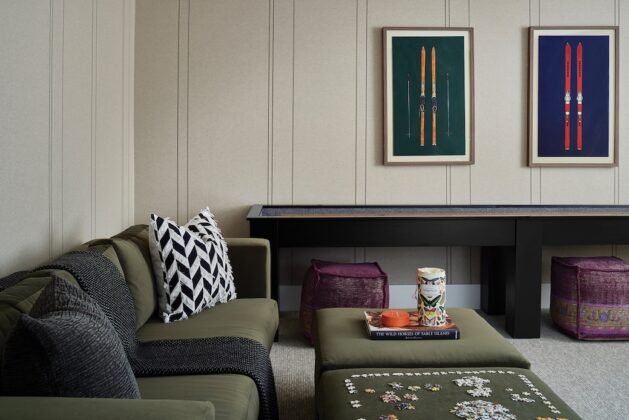 The rec room design adds a sophisticated twist to traditional ski home d&eacute;cor.