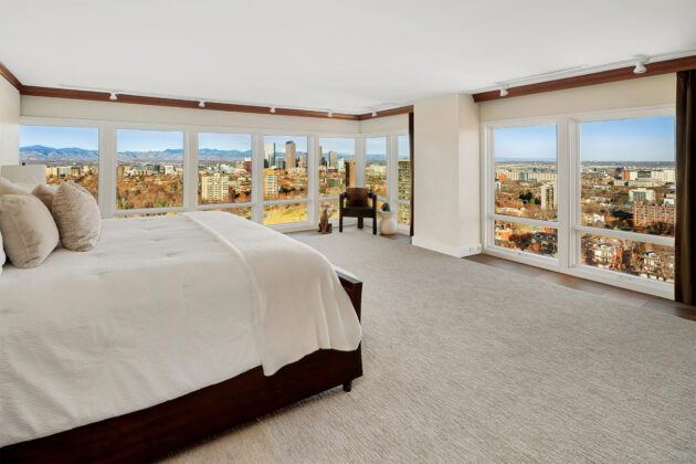 The primary suite is serene and indulgent, with unimaginable sweeping views across Cheesman Park, the skyline, and the Rockies.