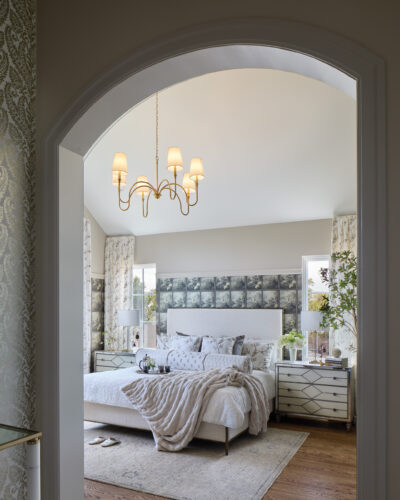 Large bed sits in the primary bedroom in the 2026 Home & Garden Colorado Designer Showhouse.