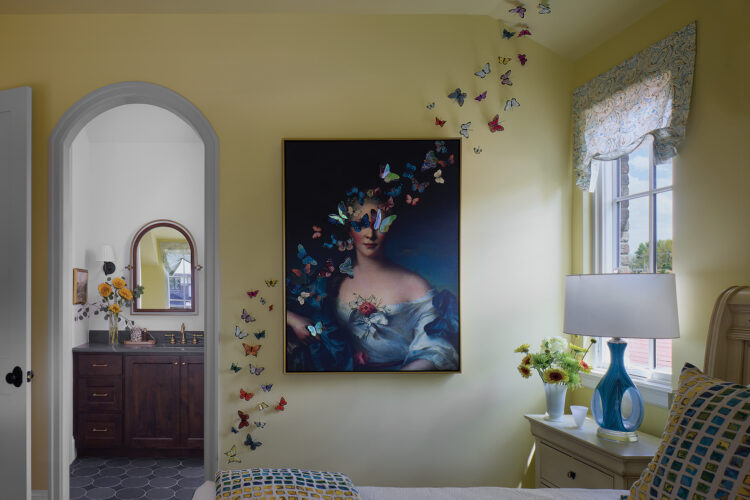 Shot of wall art and bathroom in the girls room in the 2026 Home & Garden Colorado Designer Showhouse.